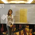 Student in front of posters 4
