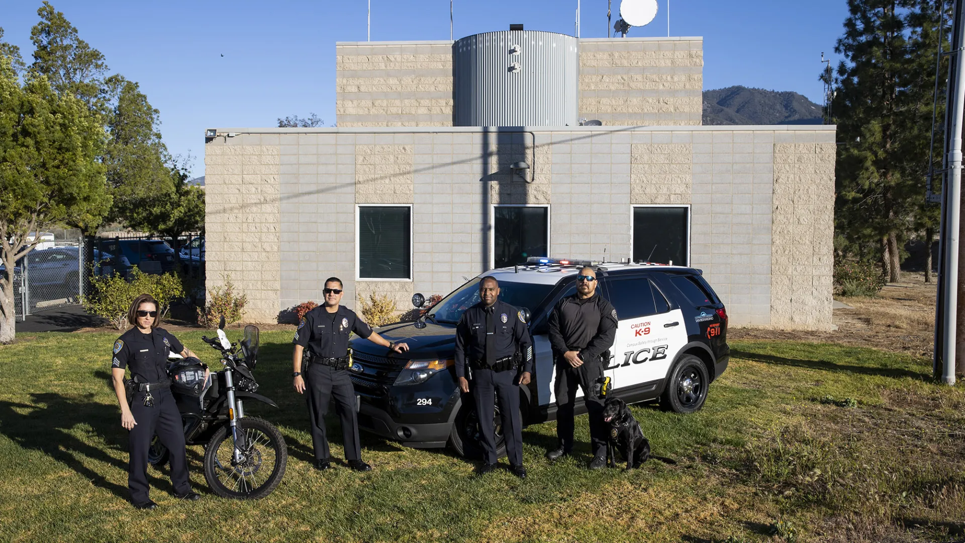 From left, Sgt. Devon Herrington, Sgt. Jose Plasencia, Chief John Guttierez, K9 Officer Manuel Aguirre and Police K9 Vader. The CSUSB University Police Department celebrates 50 years of service in 2024.