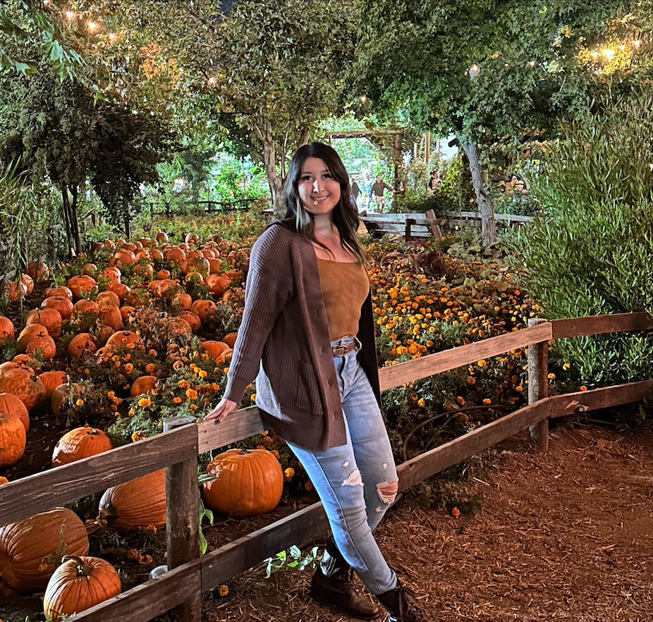 Celeste Nunez in a pumpkin patch